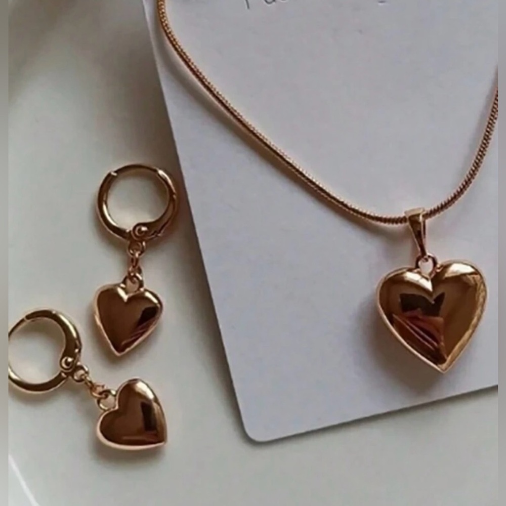 Set Of Gold Heart Necklace & Earrings
Zinc Alloy steel - Picture 1 of 4